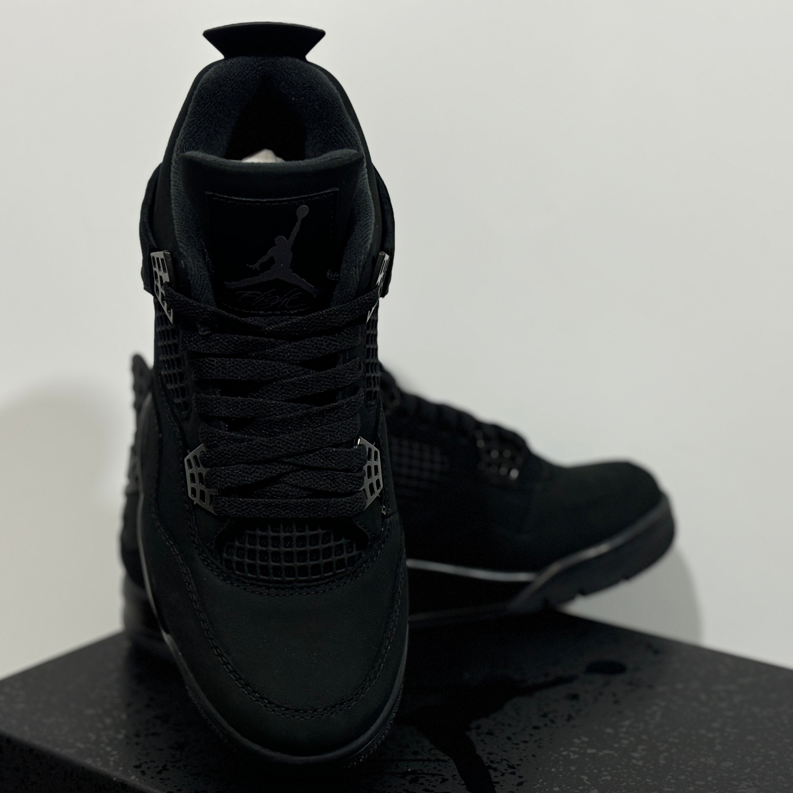 Jordan 4 black cat